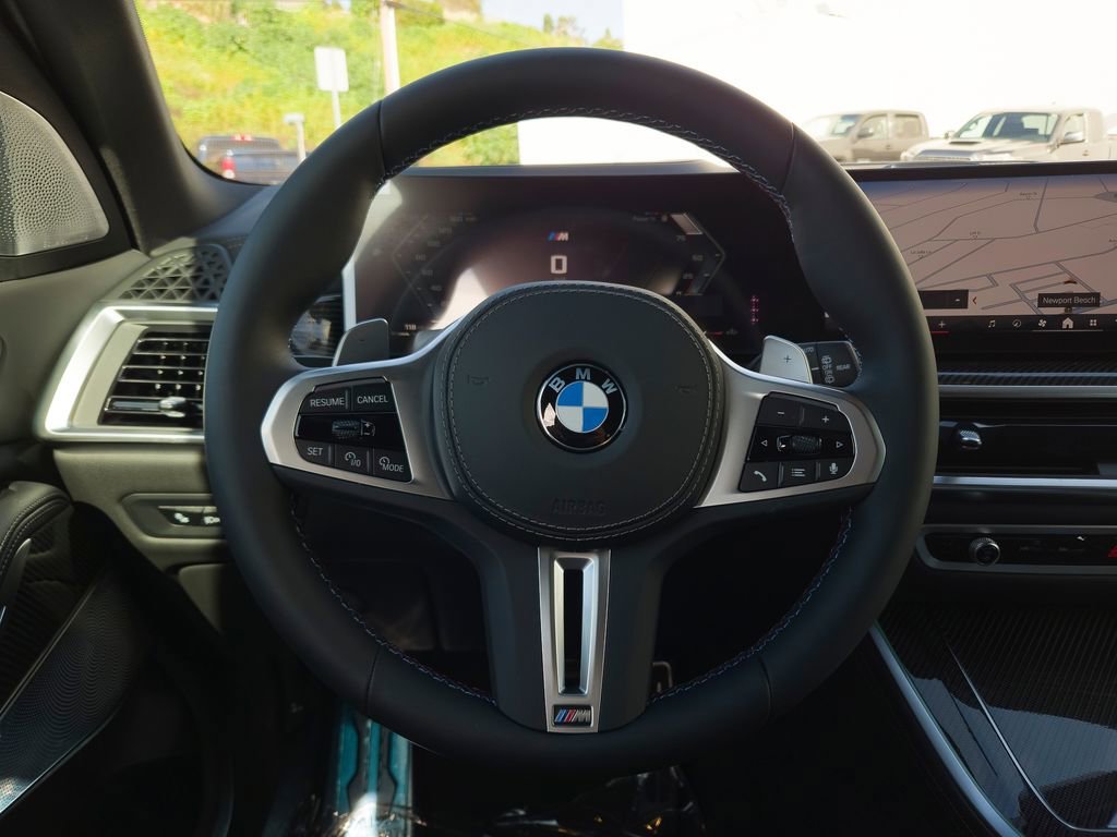 New 2026 Black Sapphire Metallic BMW M60i image 14