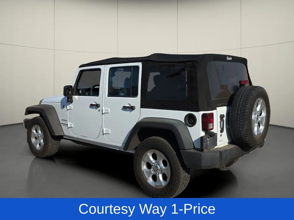 Used 2013 White Jeep Unlimited Sport image 7