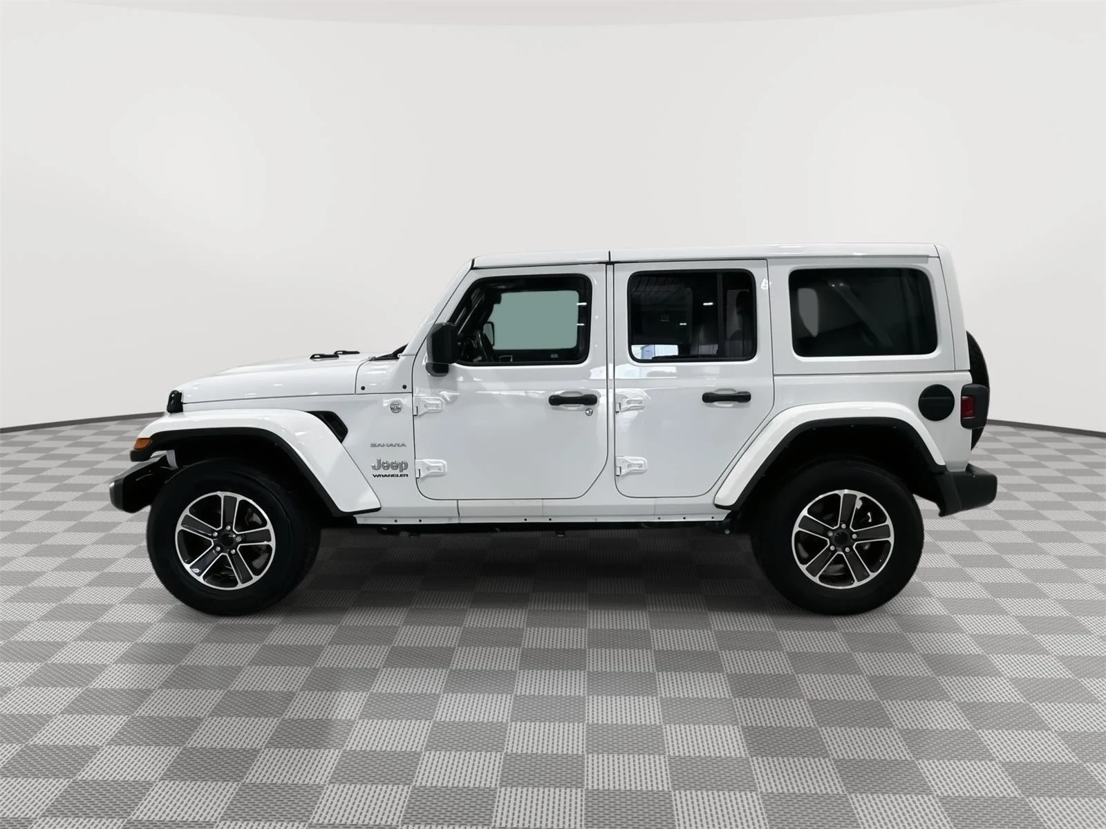 Used 2023 Jeep Wrangler 4-Door Sahara with VIN 1C4HJXEG3PW595447 for sale in Alexandria, Minnesota
