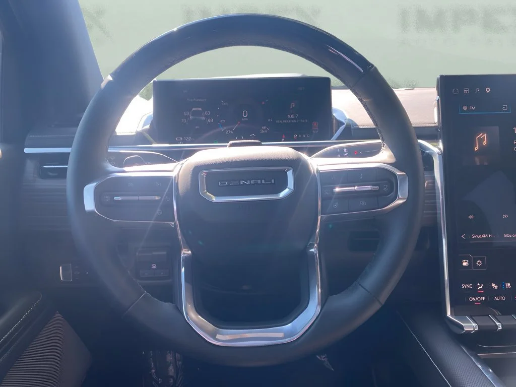 Used 2025 Onyx Black GMC Max Range Denali image 24