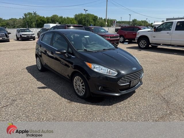 Used 2014 Black Ford Titanium image 1