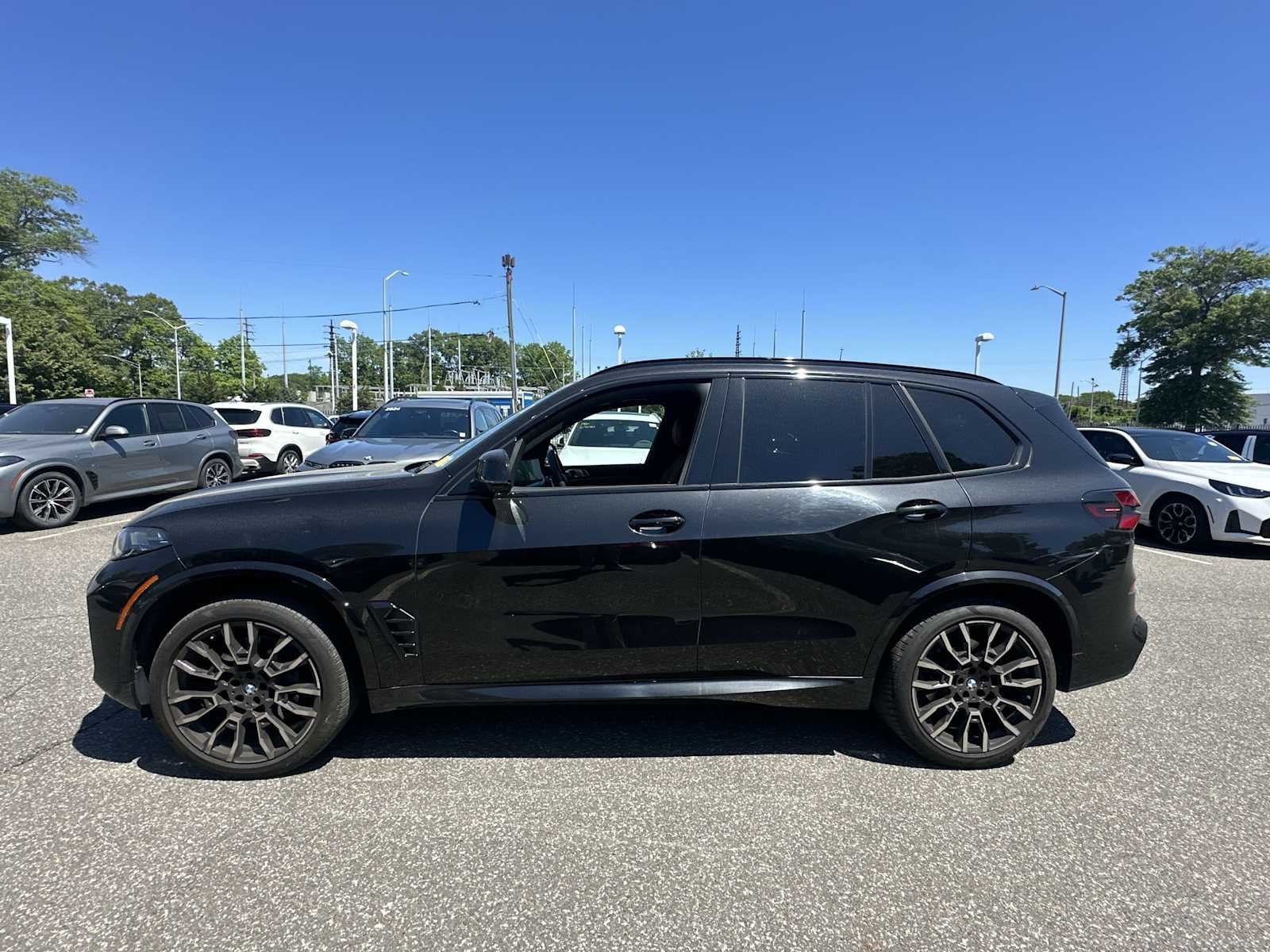 Certified Used 2024 Black Sapphire Metallic BMW xDrive40i image 3