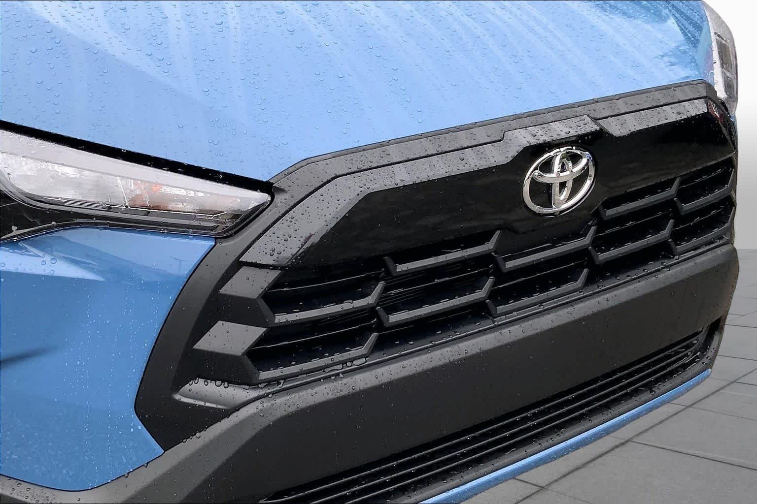 Used 2026 Cavalry Blue Toyota LE image 29
