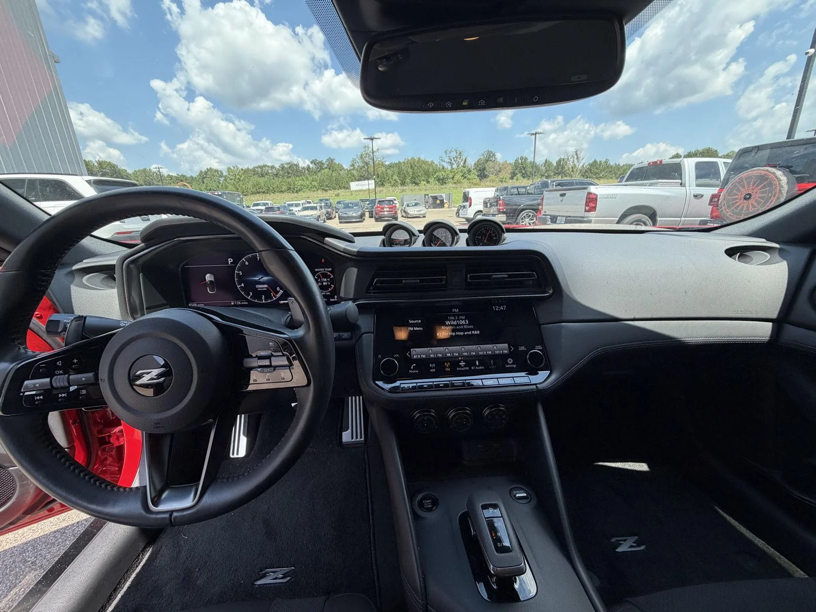 Used 2025 Solid Red/Super Black Nissan Performance image 7