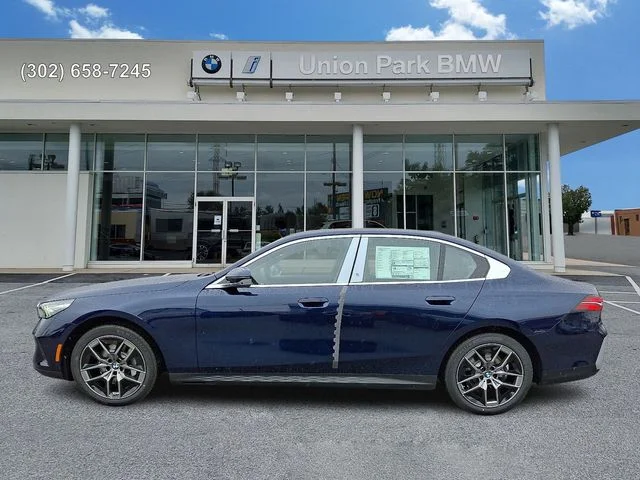 Used 2026 Tanzanite Blue II Metallic BMW 530i xDrive image 7
