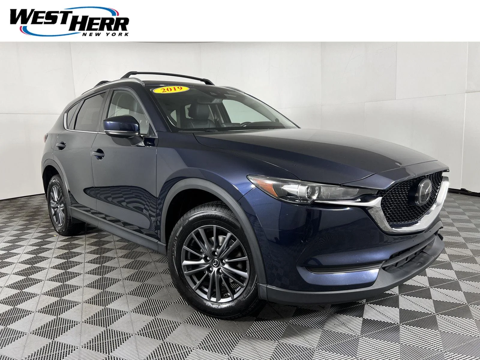 Used 2019  Mazda Touring image 1