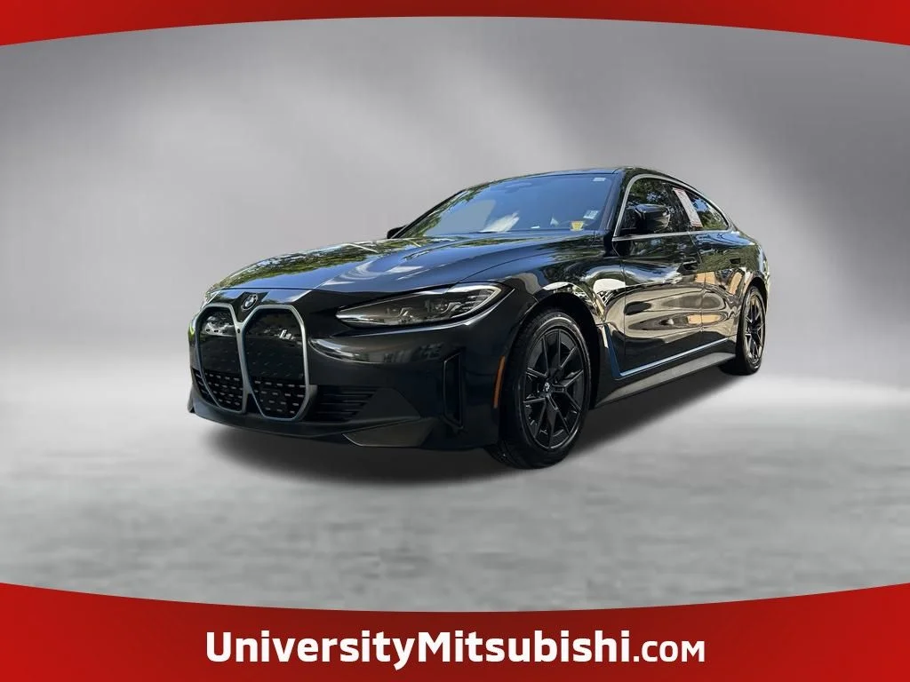 Used 2024 Black BMW eDrive40 image 1