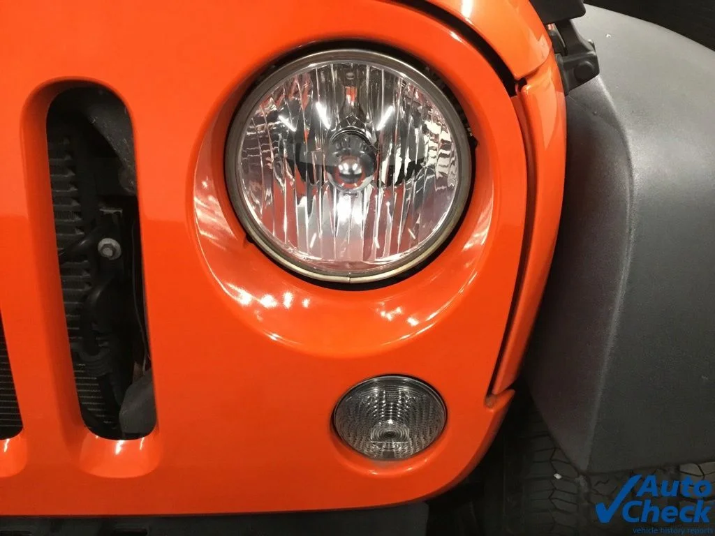 Used 2015 Orange Jeep Unlimited Sport image 22