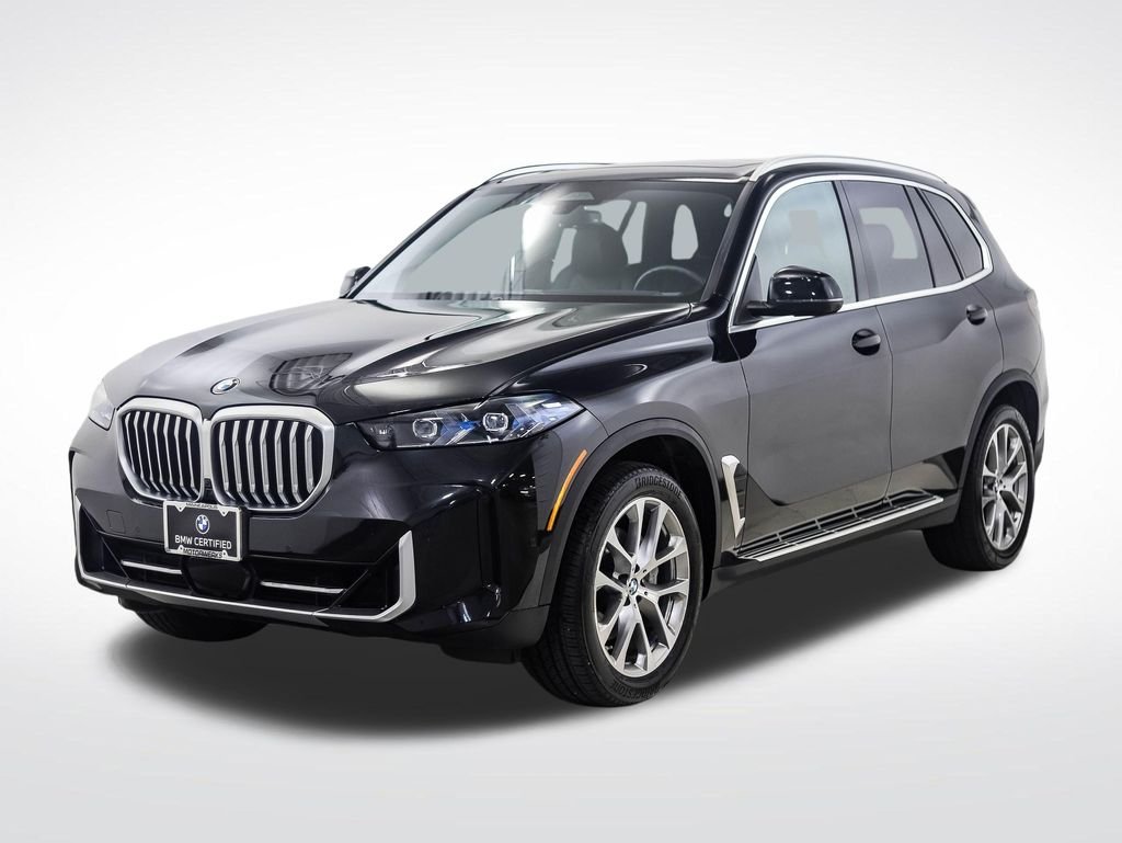Certified Used 2026 Black Sapphire Metallic BMW xDrive40i image 1