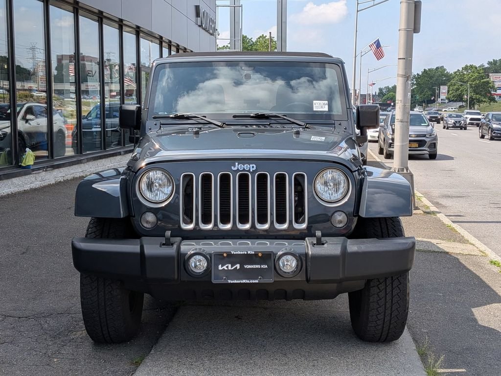 Used 2016 Black Jeep Unlimited Sahara image 3