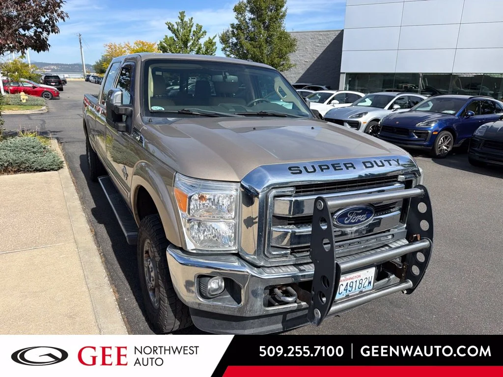Used 2014 Beige Ford Lariat image 1
