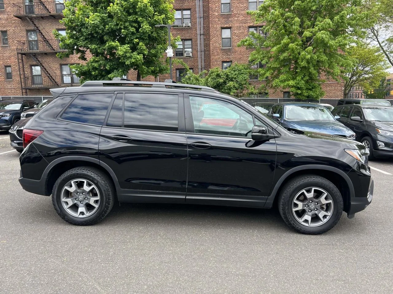 Used 2023 Crystal Black Pearl Honda AWD TrailSport image 5