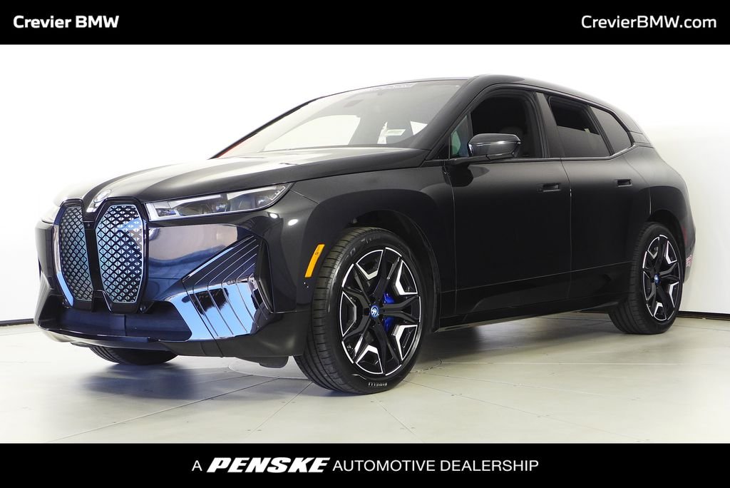Certified Used 2024 Black Sapphire Metallic BMW xDrive50 image 1