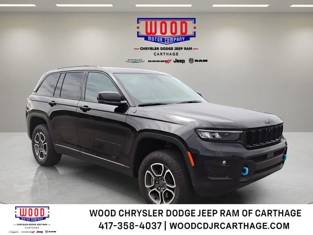 Used 2023 Diamond Black Crystal Pearlcoat Jeep Trailhawk 4xe image 1