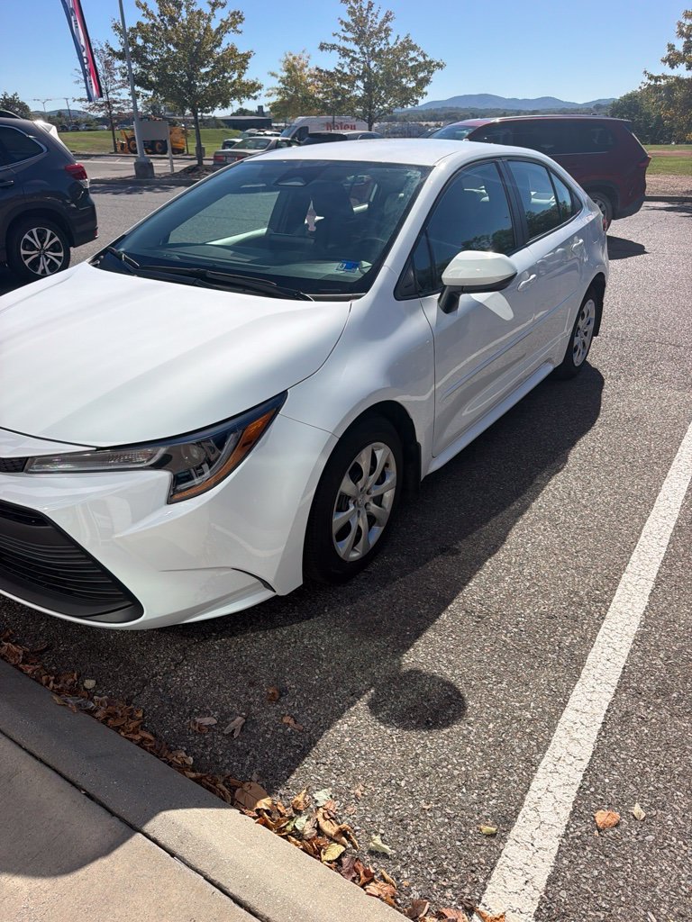 Used 2025 White Toyota LE image 2