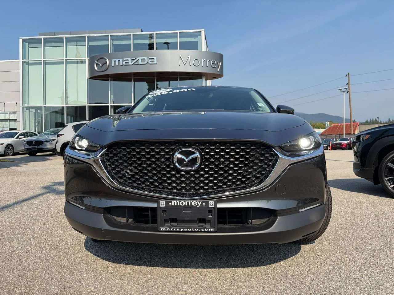 Used 2024 Machine Grey Metallic Mazda GX AWD AWD with Low Mileage! On sale. Come check it out. Finance available. image 2
