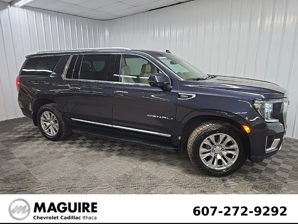Used 2023 Titanium GMC Denali image 1