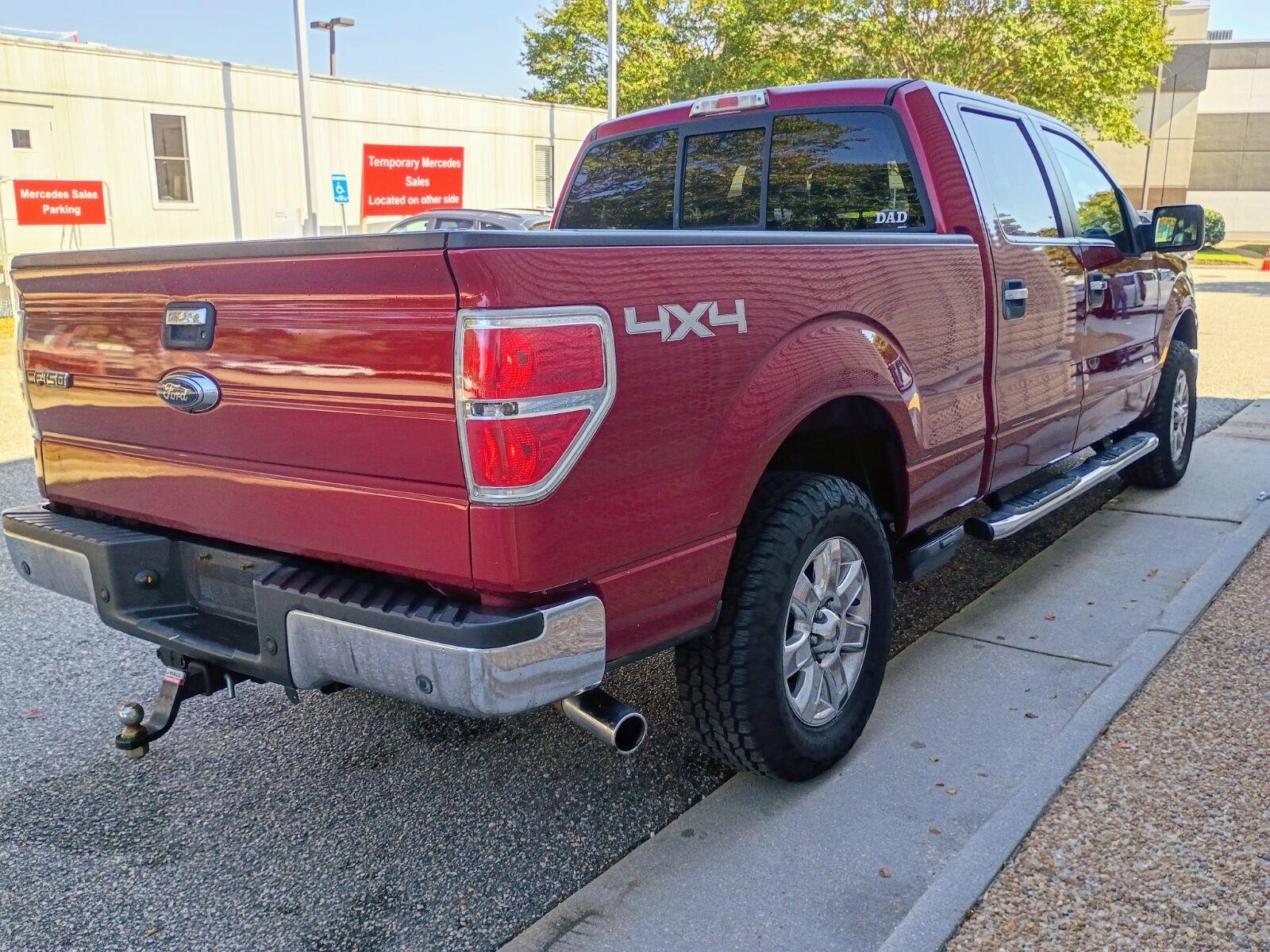 Used 2014 Ruby Red Metallic Tinted Clearcoat Ford XLT image 4