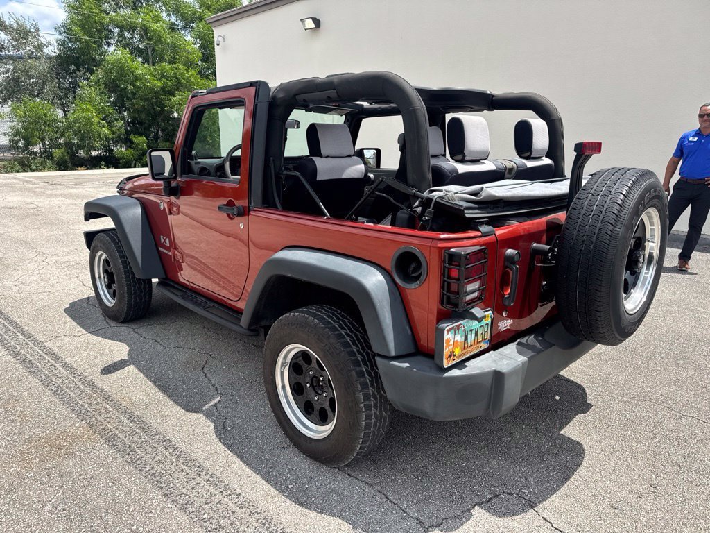 Used 2009 Sunburst Orange Pearl Jeep X image 5