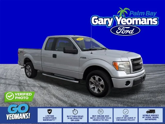 Used 2014 Ingot Silver Ford STX image 1