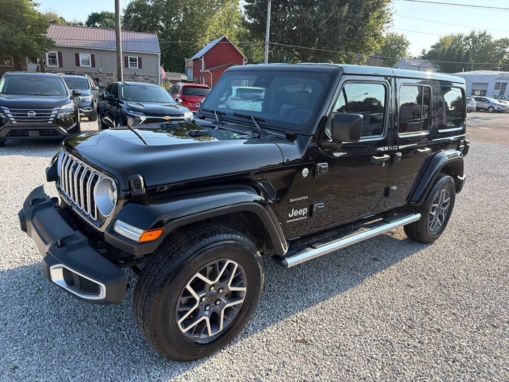 Used 2024 Black Jeep Sahara image 1