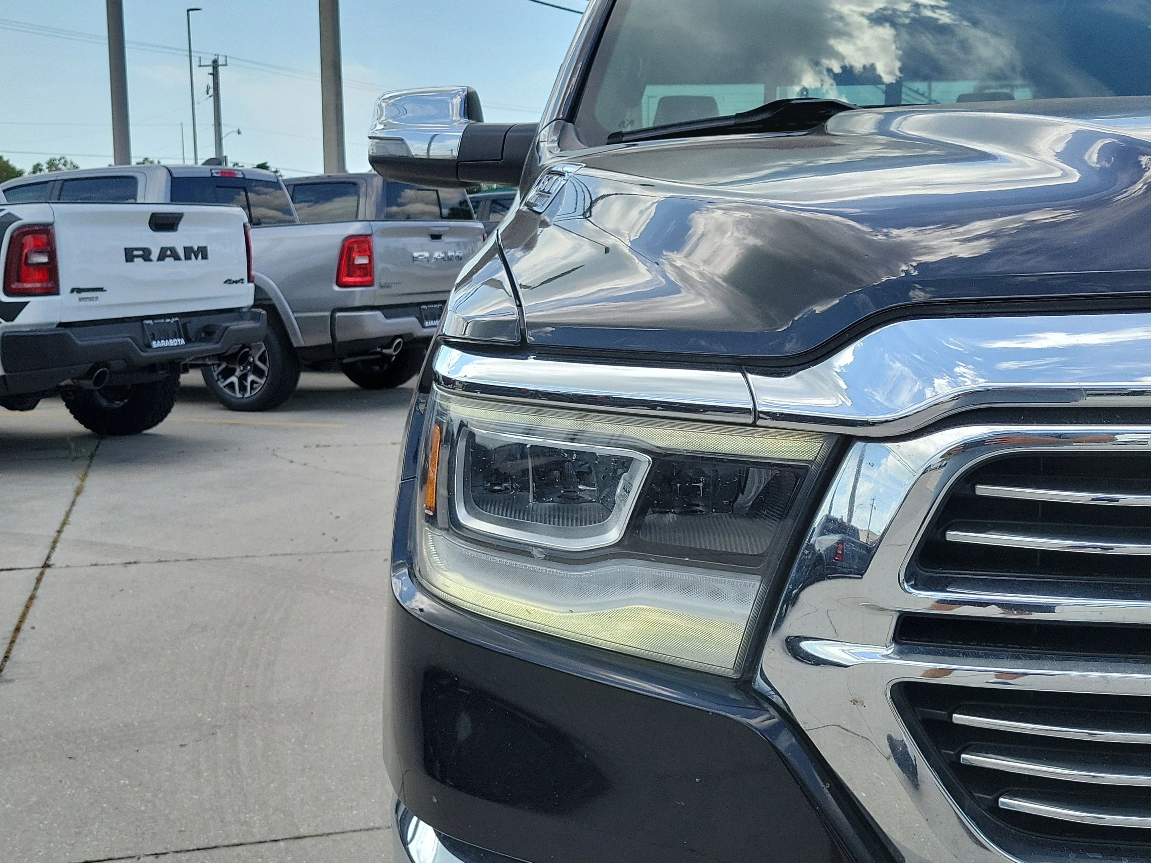 Used 2023 Diamond Black Crystal Pearlcoat Ram Laramie image 7