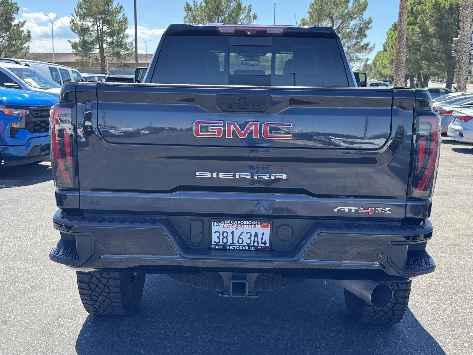 Used 2024 Titanium Rush Metallic GMC AT4X image 5