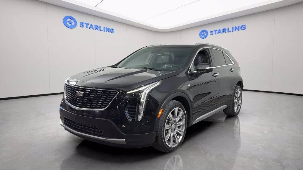 Used 2023 STELLAR BLACK METALLIC Cadillac FWD Premium Luxury image 2