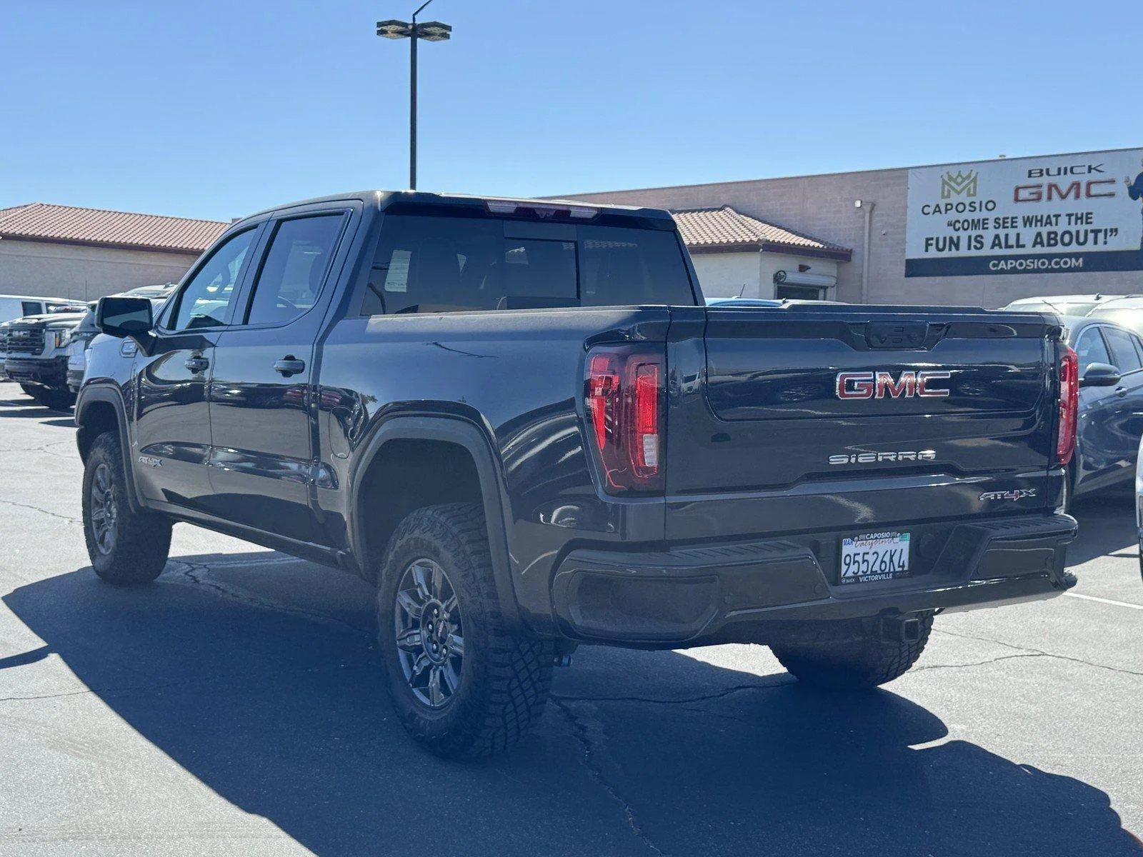 New 2026 TITANIUM RUSH METALLIC GMC AT4X image 4