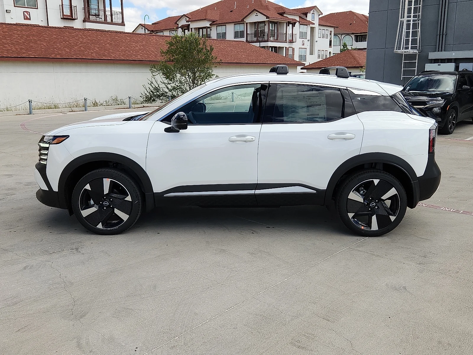 New 2026 QAC Aspen Whit Nissan SR All-Wheel Drive image 2