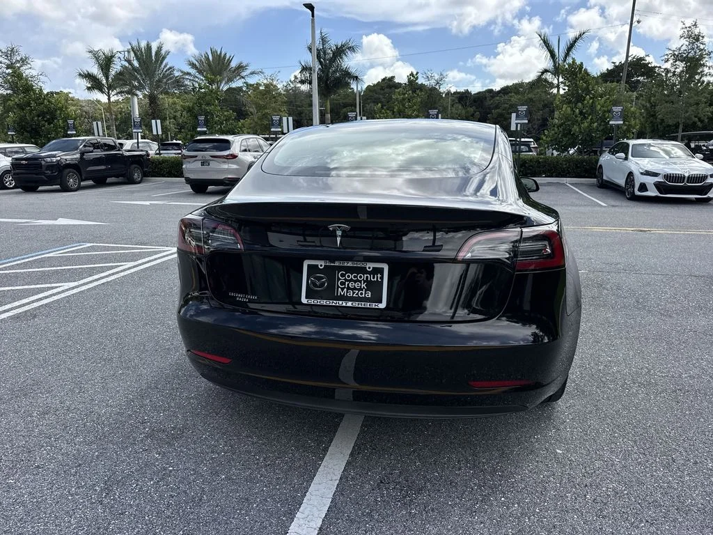 Used 2023 Solid Black Tesla  image 25