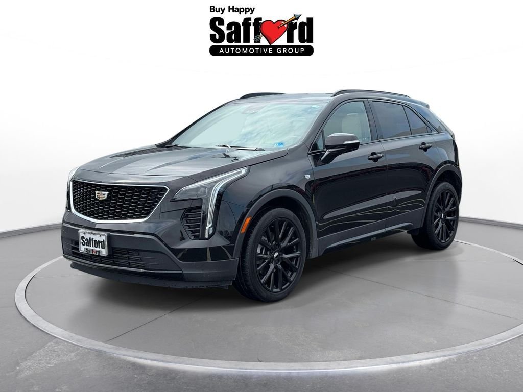 Used 2023 Black Cadillac Sport image 1