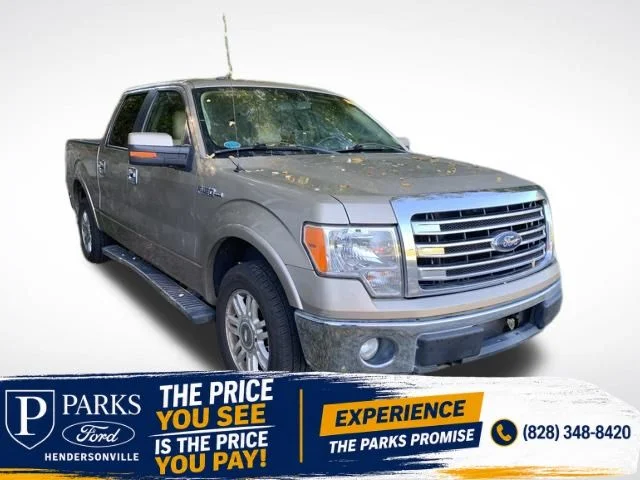 Used 2013 Gold Ford Lariat image 1