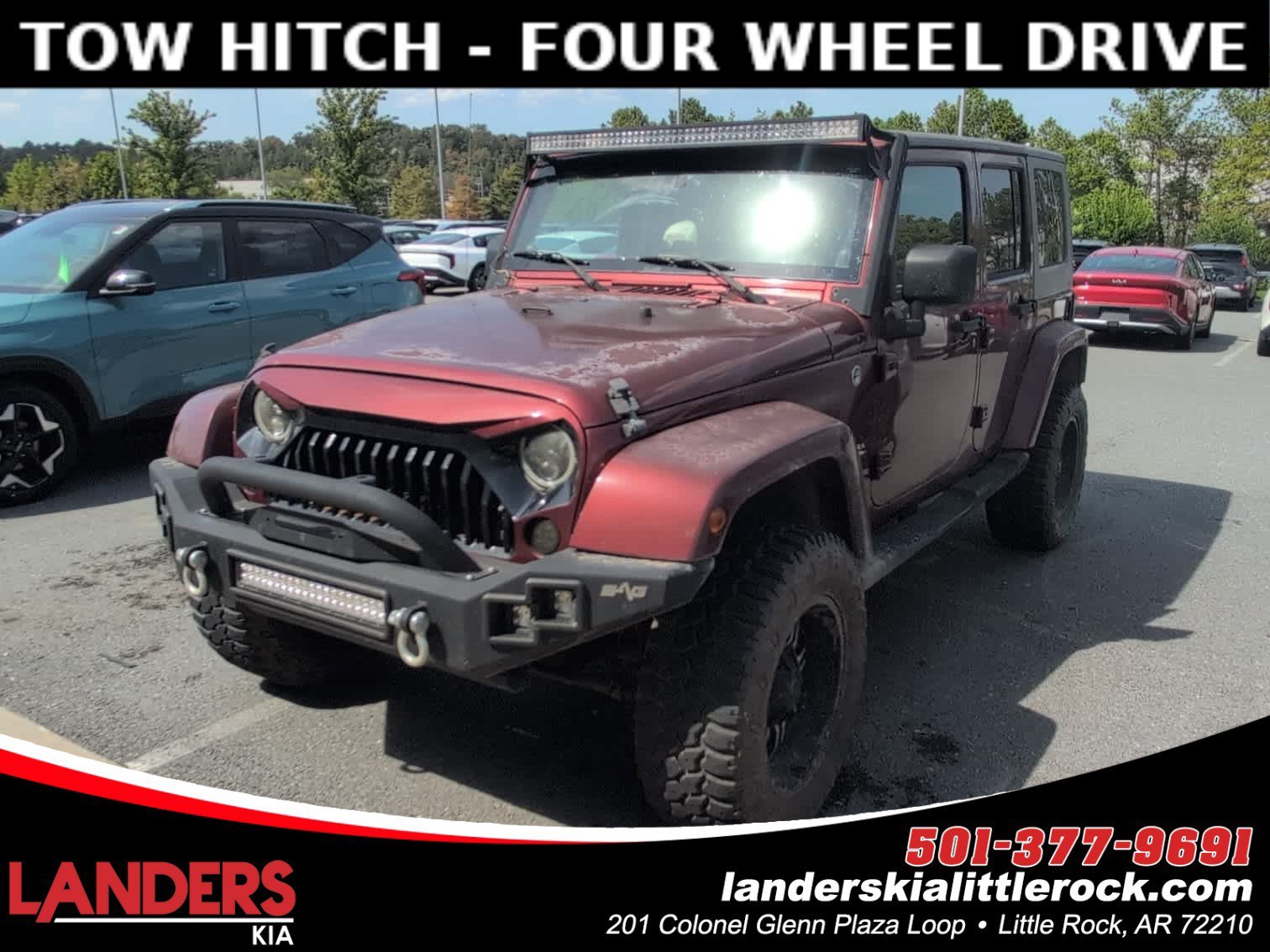 Used 2007 Red Rock Crystal Pearl Jeep Unlimited Sahara image 1