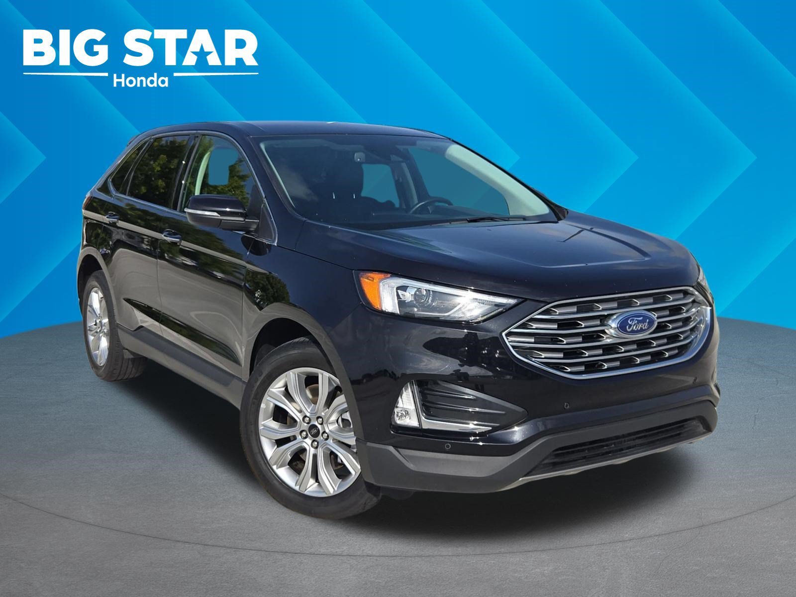 Used 2024 Black Metallic Ford Titanium image 1