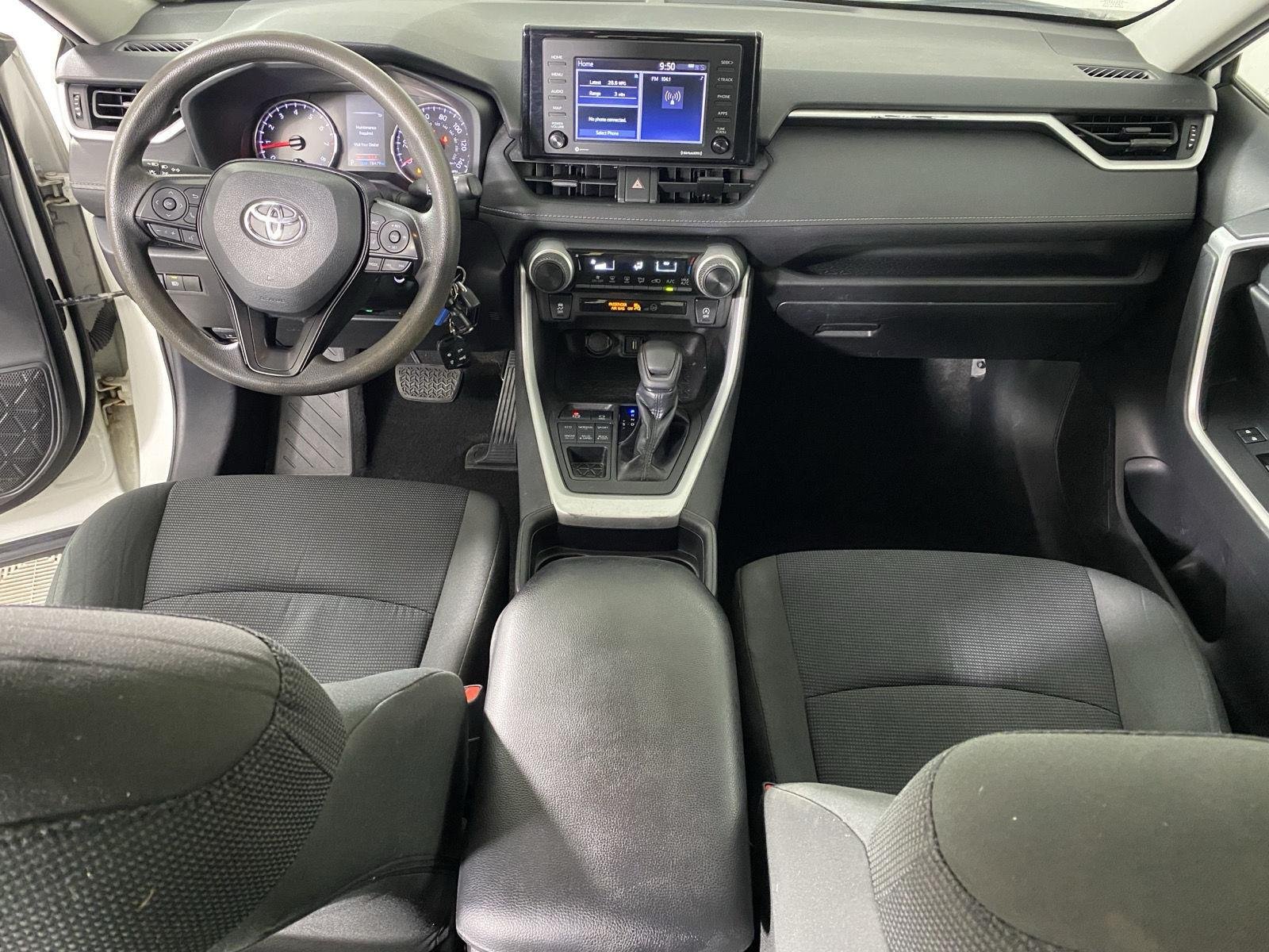 Used 2021 Super White Toyota LE image 22