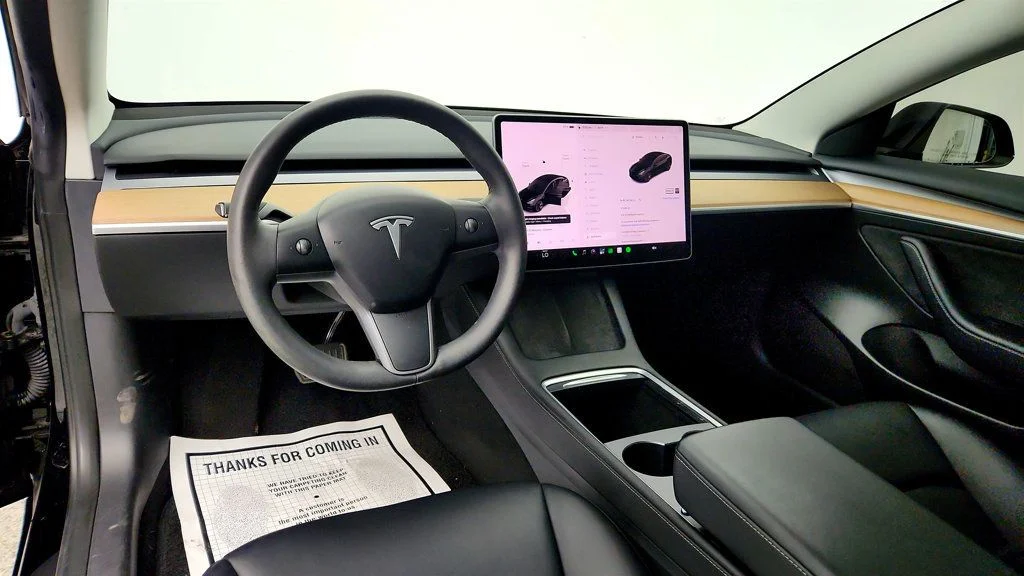 Used 2023 Solid Black Tesla RWD image 12