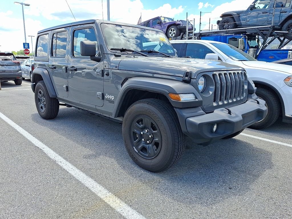 Used 2021 Gray Jeep Unlimited Sport image 1