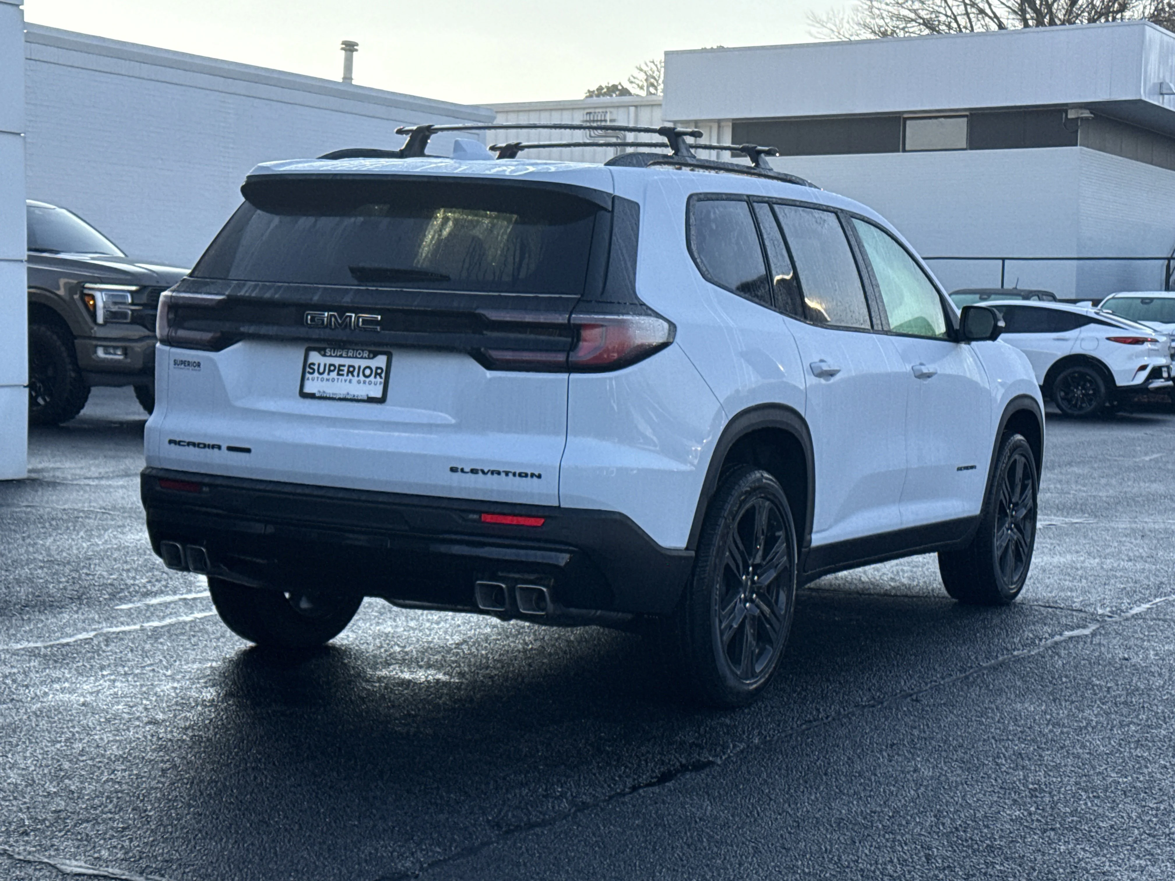 New 2026 Glacier White Tricoat GMC AWD Elevation image 3