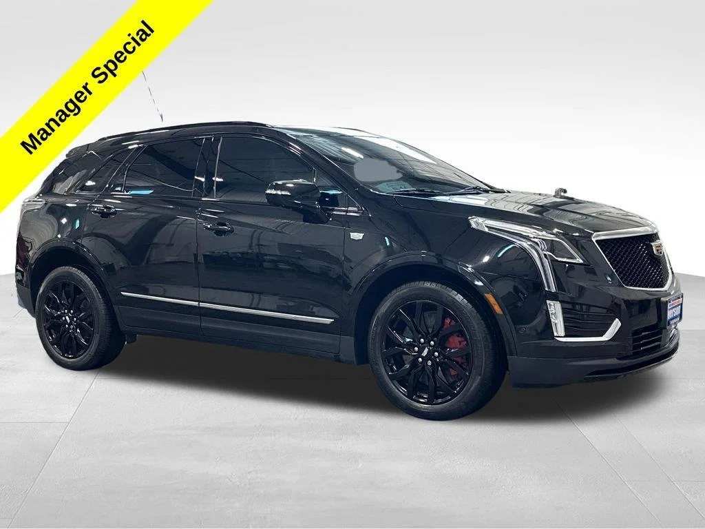 Used 2023 Stellar Black Metallic Cadillac AWD Sport image 1