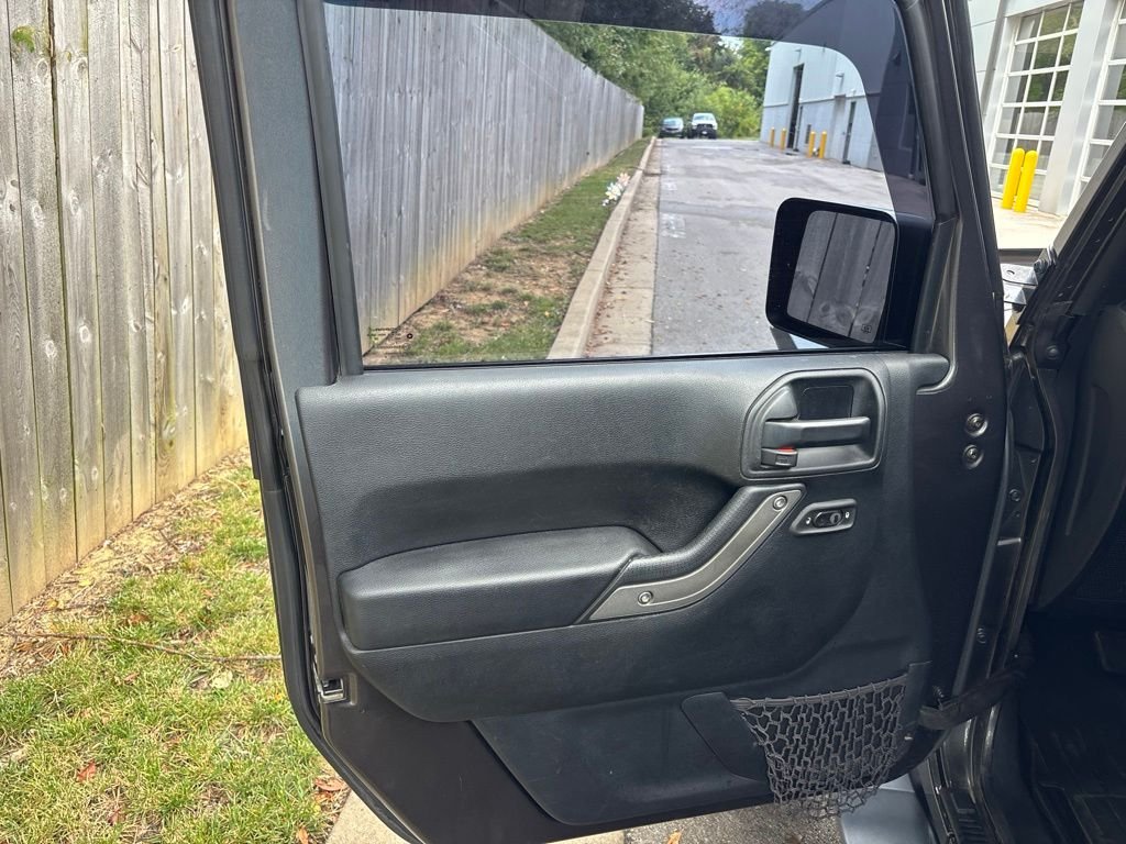 Used 2017 Gray Jeep Unlimited Sport image 22