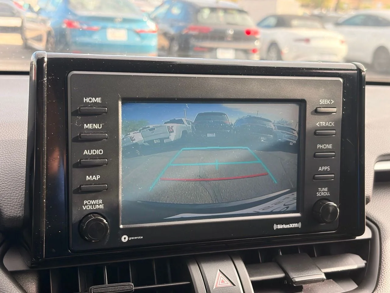 Used 2022 Midnight Black Metallic Toyota LE image 23
