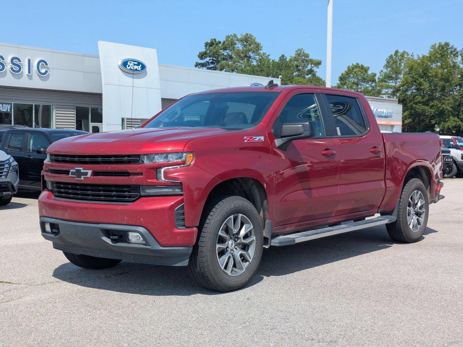 Used 2021 Cherry Red Tintcoat Chevrolet RST image 1