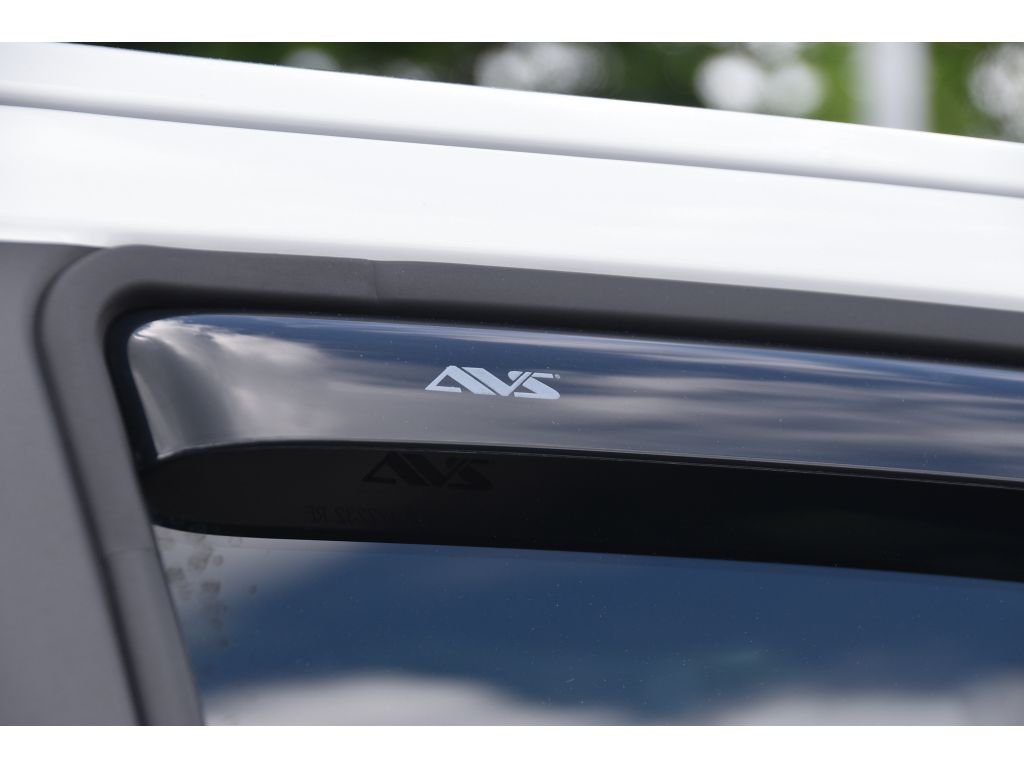 Used 2024 Summit White GMC 4WD AT4 image 25