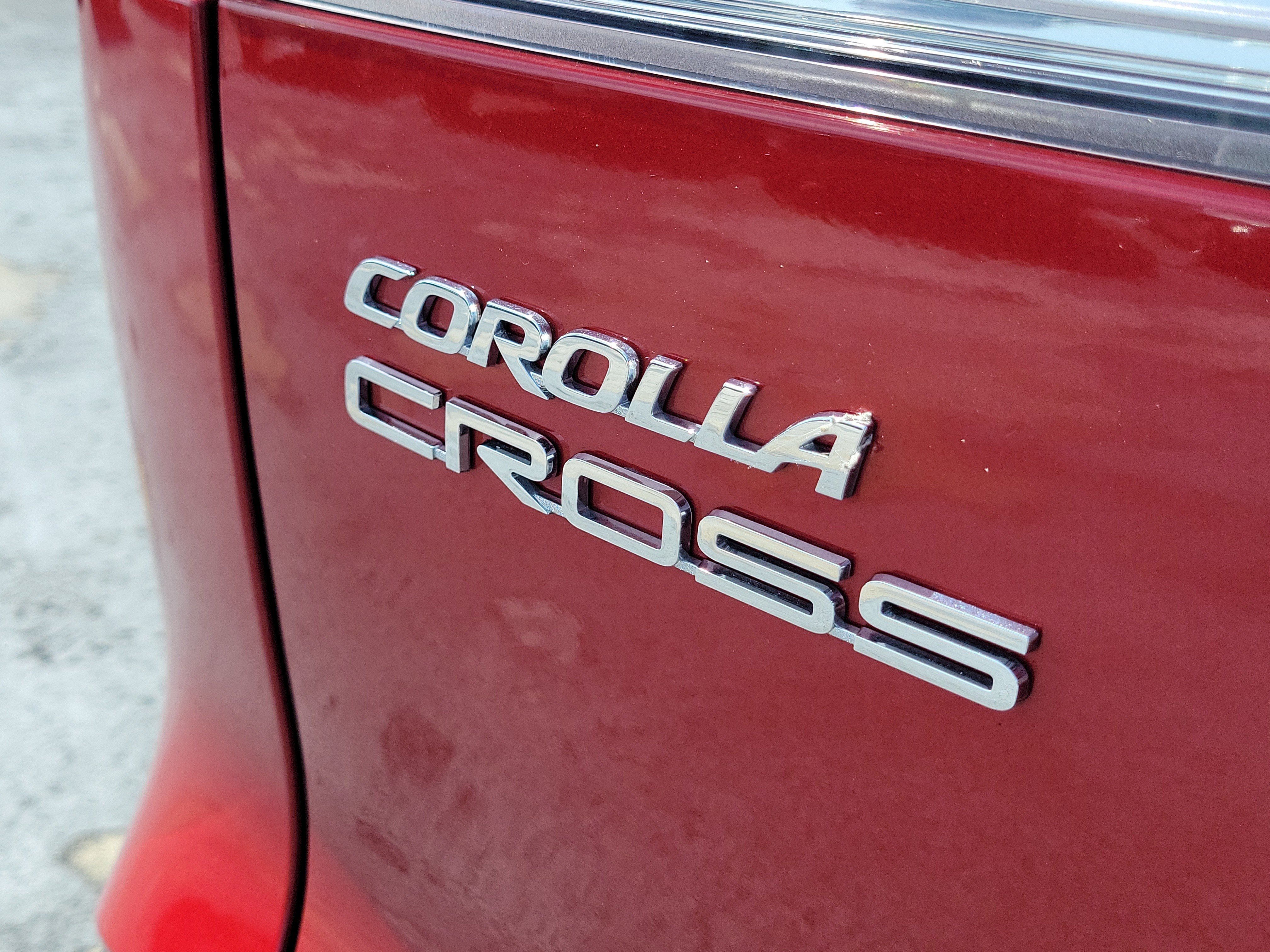 Certified Used 2024 Barcelona Red Metallic Toyota LE image 9