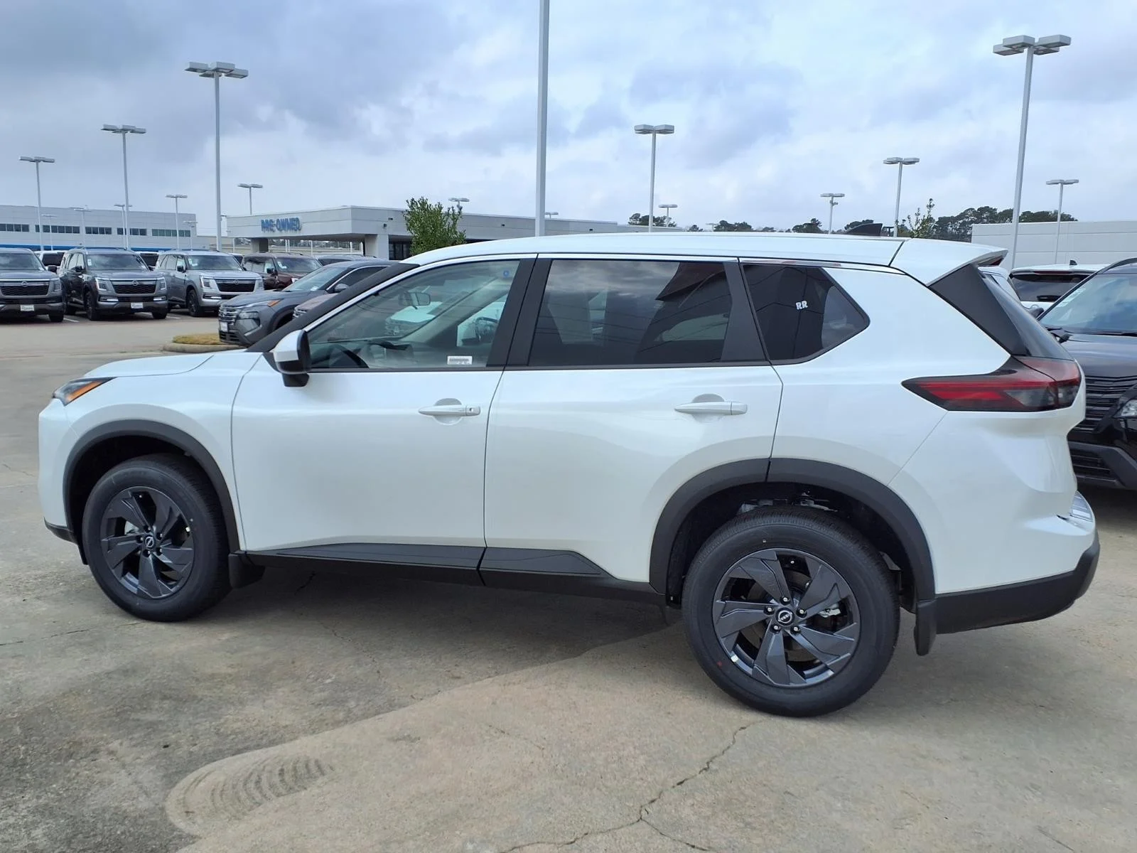 2026 Nissan Rogue SV White at Robbins Nissan