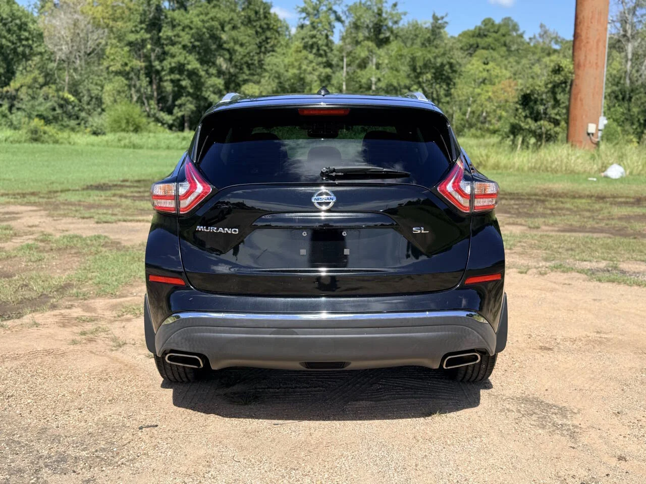 Used 2016 Black Nissan SL 4dr SUV image 4