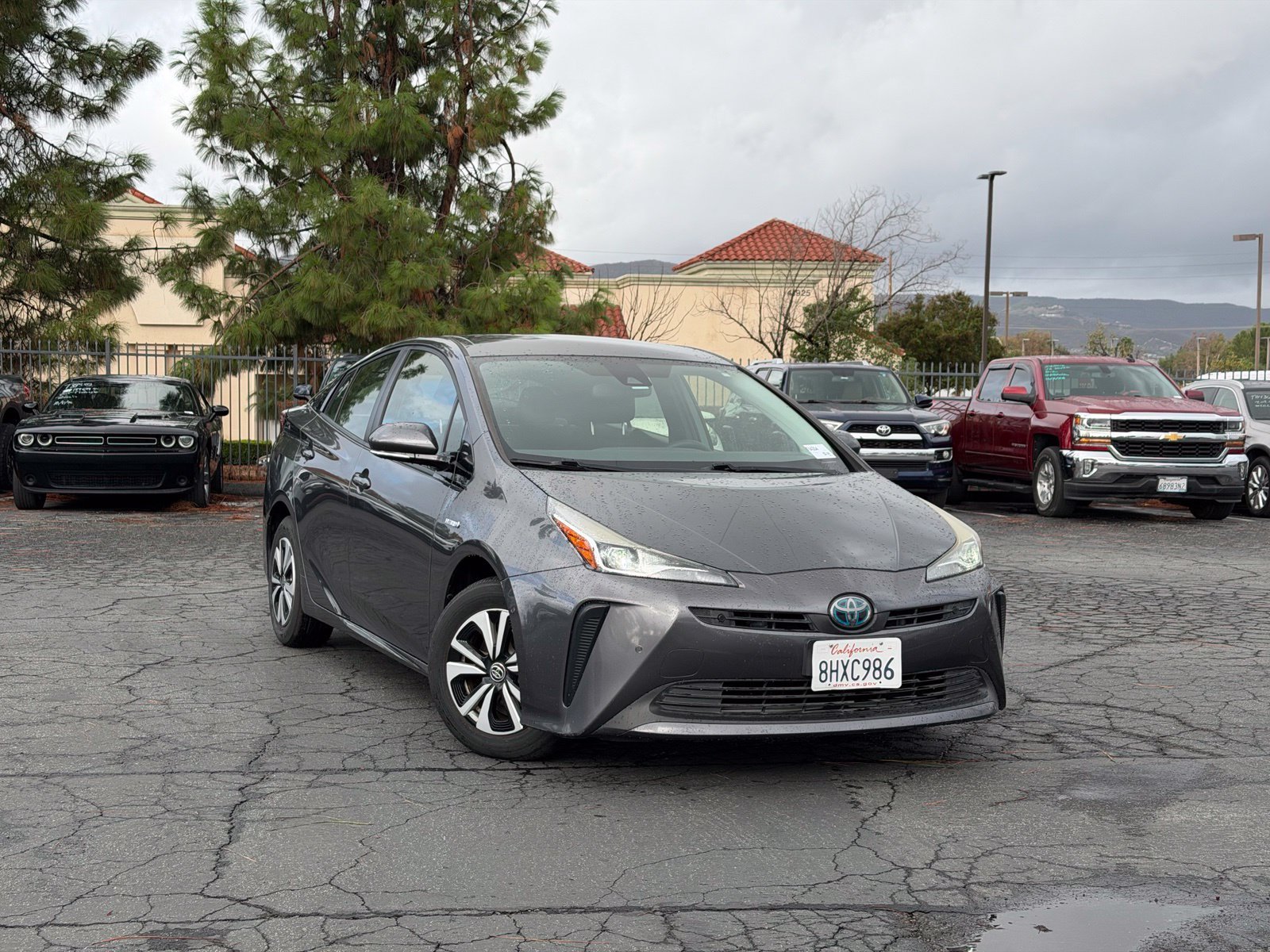 Used 2019 Magnetic Gray Metallic Toyota LE image 1