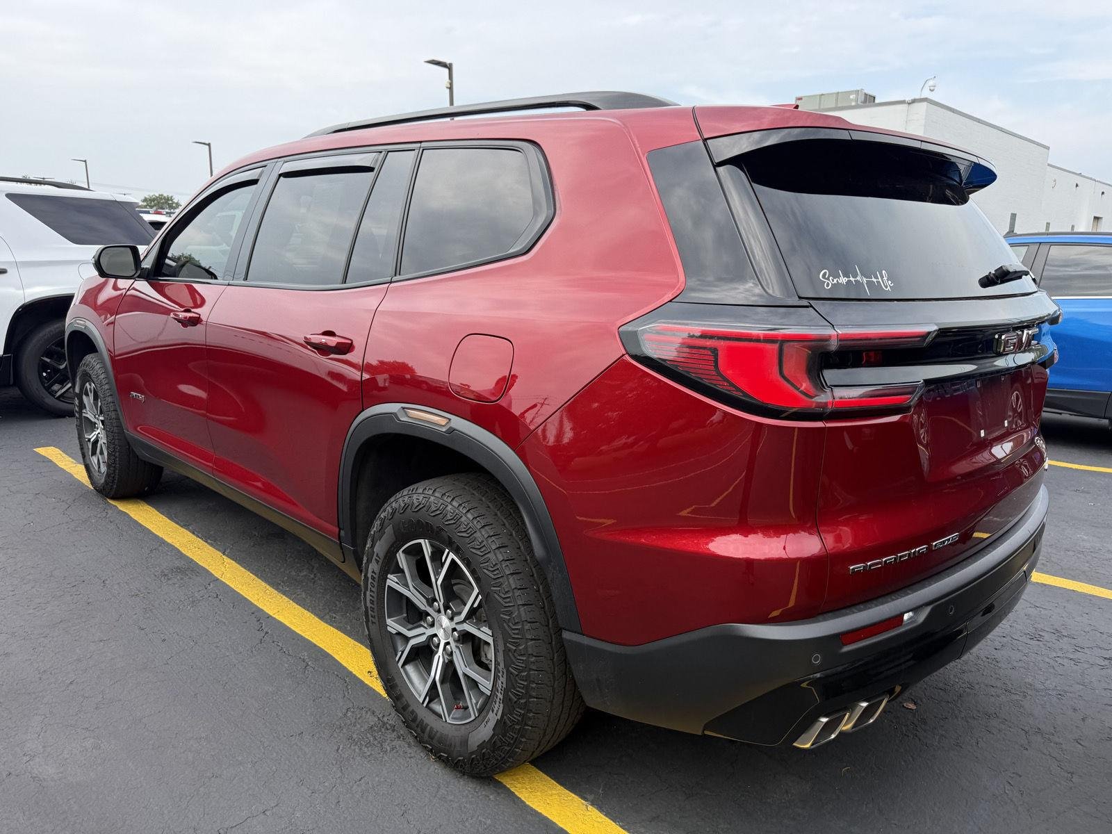 Used 2024 Volcanic Red Tintcoat GMC AWD AT4 image 4