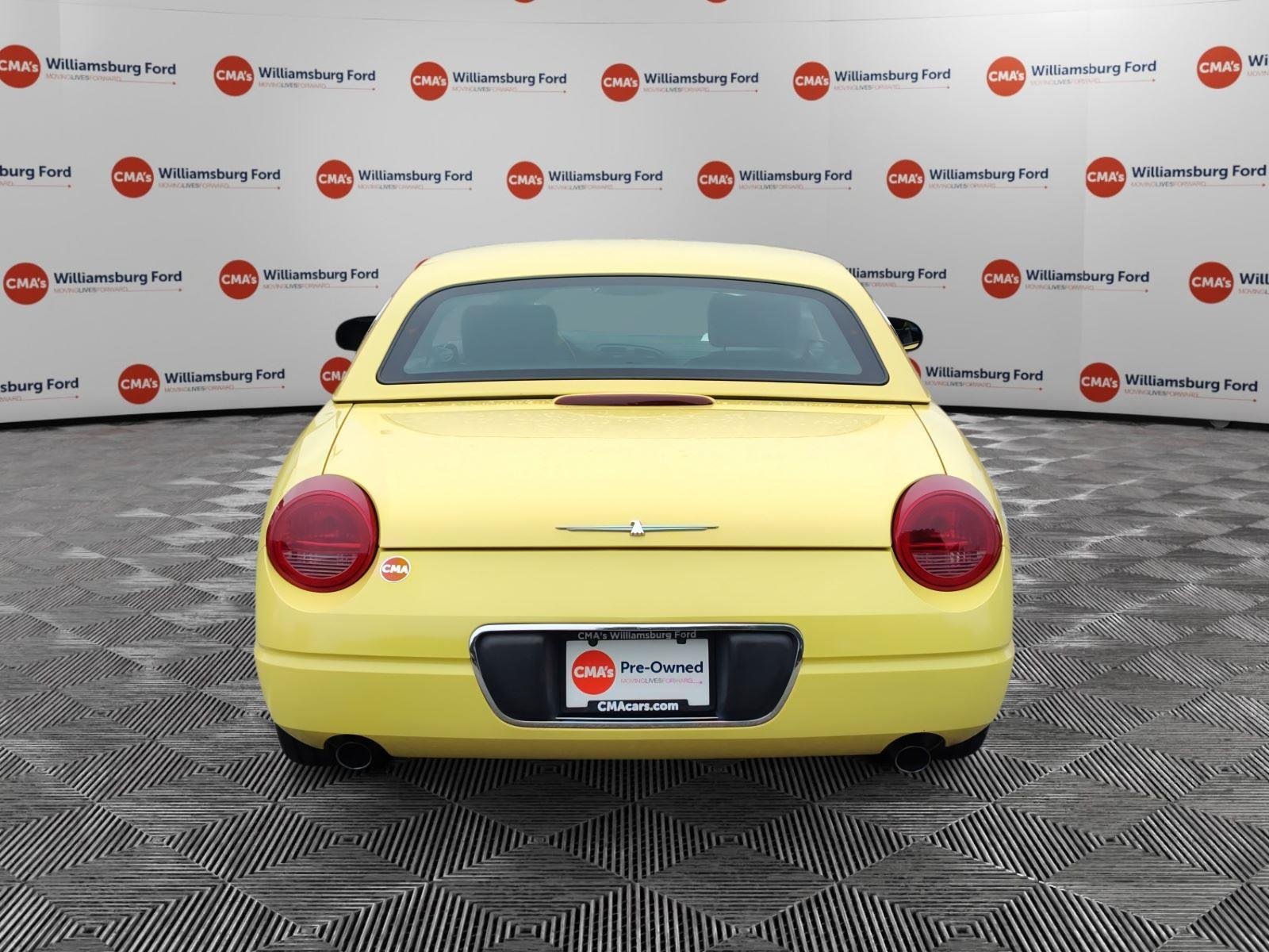 Used 2002 Inspiration Yellow Ford Deluxe image 4